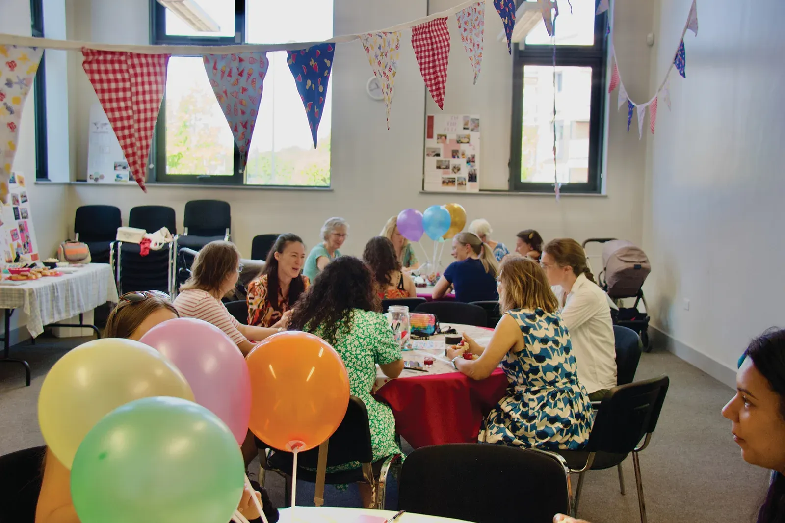 MumCo members gathered around a table